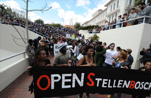 Students from the movement, Open Stellenbosch, 'Luister' and Rhodes must Fall during a march at Stellenbosch University. Gallo images