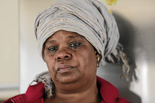 Kamma Dlamini-Pooe sheds tears for her nephew Karabo who was hacked to death by a mob over crime allegations. / Alaister Russell