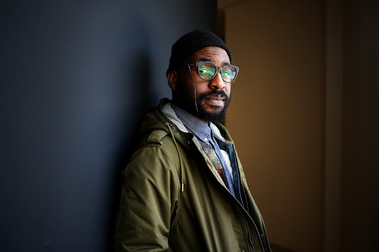 Zimbabwean artist, Kudzanai Chiurai, poses for a portrait at The Goodman Gallery, in Rosebank, Johannesburg.