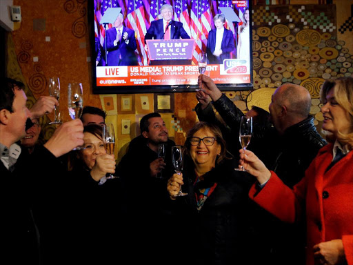 Residents celebrate during the US presidential election in Melania Trump's hometown of Sevnica, Slovenia November 9, 2016. /REUTERS