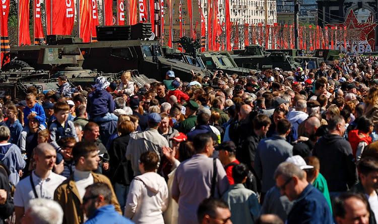 People visit an exhibition displaying armoured vehicles and equipment captured by the Russian army from Ukrainian forces in the course of Russia-Ukraine conflict, at Victory Park open-air museum on Poklonnaya Gora in Moscow, Russia, on May 1 2024.