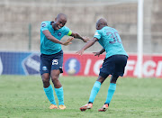 Simphiwe Mcineka, left, of Richards Bay celebrates a goal with teammate Sanele Barns during their match against Kaizer Chiefs on Sunday. 