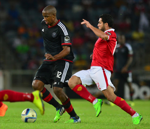 Housam Mohamed Ashour and Thasanqua Aubrey Gabuza of Orlando Pirates during the 2015 CAF Confederation Cup Semi Final. Picture Credit: Gallo Images