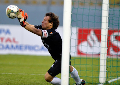 A Peruvian goalkeeper saved four penalties and scored the winner himself to take his side Cesar Vallejo into the quarter-finals of the Copa Sudamericana for the first time.
