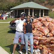 Annual rice drive organiser Lisa Sukdev with Gerald Anthony, who donated 13 tonnes for the cause.