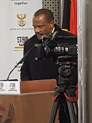 National Head of the Directorate for Priority Crime Investigation, Lt Gen Godfrey Lebeya, addressing a briefing on the Venda Building Society after eight arrests during simultaneous operations in Gauteng and Limpopo.