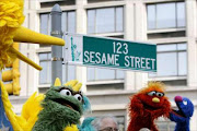 Sesame Street characters are seen during the 40th anniversary street naming celebration in New York, November 9, 2009. REUTERS/Shannon Stapleton (UNITED STATES ENTERTAINMENT EDUCATION SOCIETY)