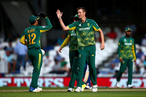 Wayne Parnell of South Africa celebrates with his teammates after dismissing Seekkuge Prasanna of Sri Lanka during the ICC Champions Trophy match between Sri Lanka and South Africa at The Kia Oval on June 3, 2017 in London, England. (Photo by Jordan Mansfield/Getty Images)