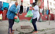 Lauren Juries, a domestic worker along with her relatives distributed food parcels to over 250 people who are in need of support in their community and continue to do so during lockdown on July 5 2020.