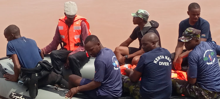 Officers from the Kenya Coast Guard help in the search and rescue mission at Kona Punda area along the Garissa-Madogo road, May 1, 2024.