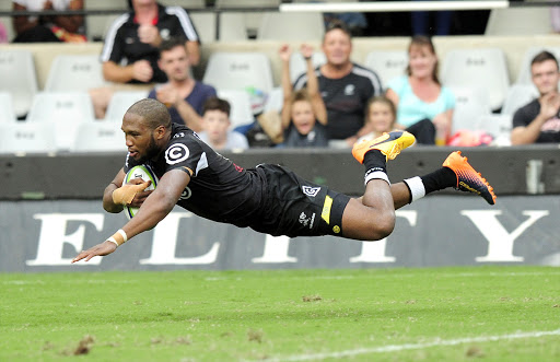 Lukhanyo Am of the Cell C Sharks scores a vital try for the Sharks during the 2017 Super Rugby game between the Sharks and the Force at Kings Park, Durban on 6 May 2017.