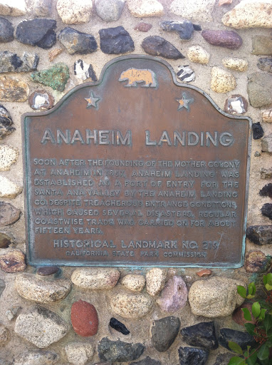This plaque is at the southern edge of Seal Beach, California, outside of some sort of military property. Soon after the founding of the Mother Colony at Anaheim in 1857, Anaheim Landing was...