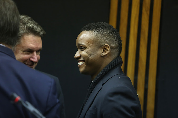 Duduzane Zuma shares a laugh with his legal team at the Randburg Magistrate's Court on July 12 2019, where he was found not guilty of culpable homicide.