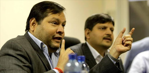 Indian businessmen Ajay and Atul Gupta