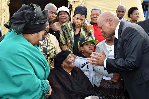 BEEN A LONG TIME: Minister in the Presidency Jeff Radebe and Minister of Defence and Military Veterans Nosiviwe Mapisa-Nqakula interact with Mrs Rebecca Kotane, the widow of the late Moses Kotane. The reception service of the mortal remains of struggle stalwarts Moses Kotane and John Beaver (JB) Marks was held at Waterkloof Air Force Base, Pretoria yesterday.