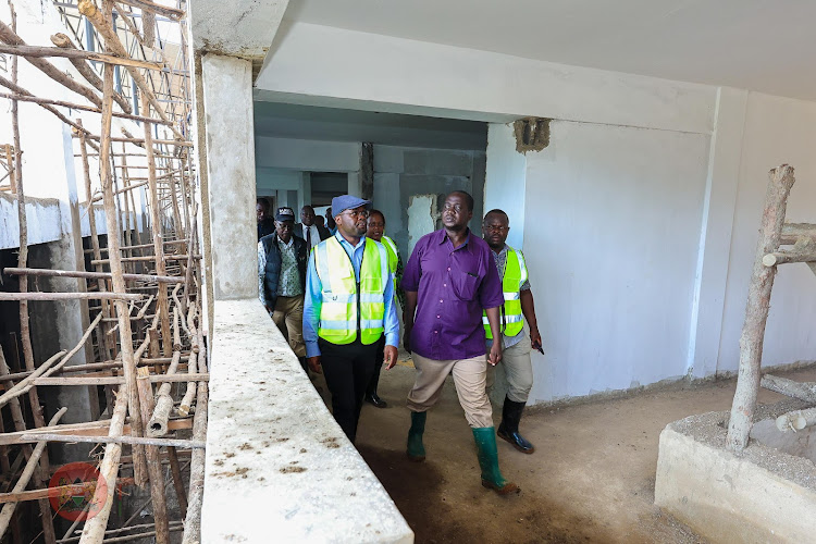 Interior PS Raymond Omollo accompanied by other leaders when he visited Masinde Muliro Stadium in Bungoma to assess preparations ahead of Madaraka Day celebration on May 9, 2024.