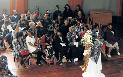 HOME AT LAST: Mourners bid farewell to East London-born jazz musician Pinise Saul at a funeral service held at the East London City Hall on Saturday. Saul died in LondonPicture: SIBONGILE NGALWA