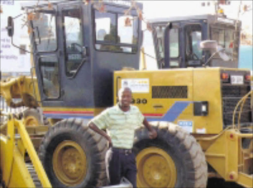 VROOM: James Baloyi communications manager of Greater Tubatse municipality with the new equipment. © Sowetan.