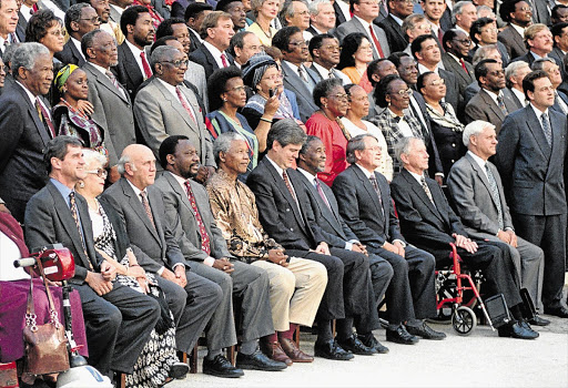 UNITED STATE: Members of the Constitutional Assembly who drafted the constitution in 1996 included Cyril Ramaphosa, Nelson Mandela, Thabo Mbeki and Tony Leon (standing, far right).