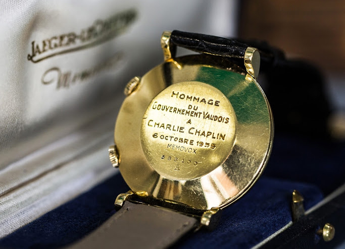 Charlie Chaplin's Jaeger‑LeCoultre Memovox watch featuring a gold case engraved with the inscription: “Hommage du gouvernement Vaudois à Charlie Chaplin – 6 octobre 1953”