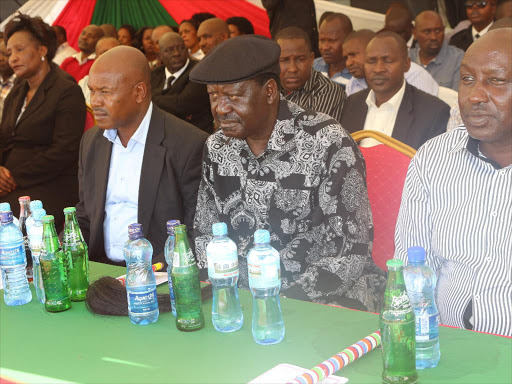 Governor David Nkedianye and Cord leader Raila Odinga during the burial of Mosiro MCA Peter Kurrinyo on April 26 / KURGAT