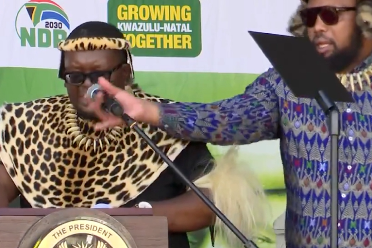 ANC KZN chairperson Siboniso Duma pulls the microphone away from Zulu traditional prime minister Thulasizwe Buthelezi in the middle of his speech.