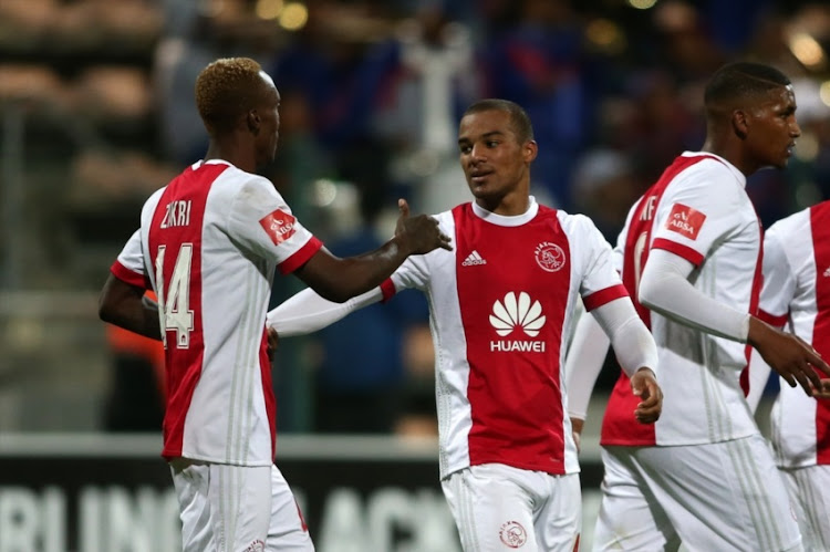 Yannick Zakri of Ajax Cape Town congratulates Fagrie Lakay of Ajax Cape Town for scoring during the Absa Premiership match between Ajax Cape Town and SuperSport United at Athlone Stadium on February 28, 2018 in Cape Town.