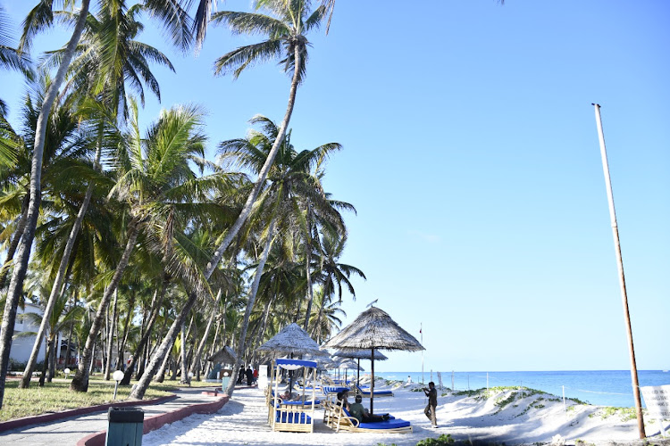 Local and international tourists enjoy the ocean breeze at the Diani Reef Beach Resort in South Coast