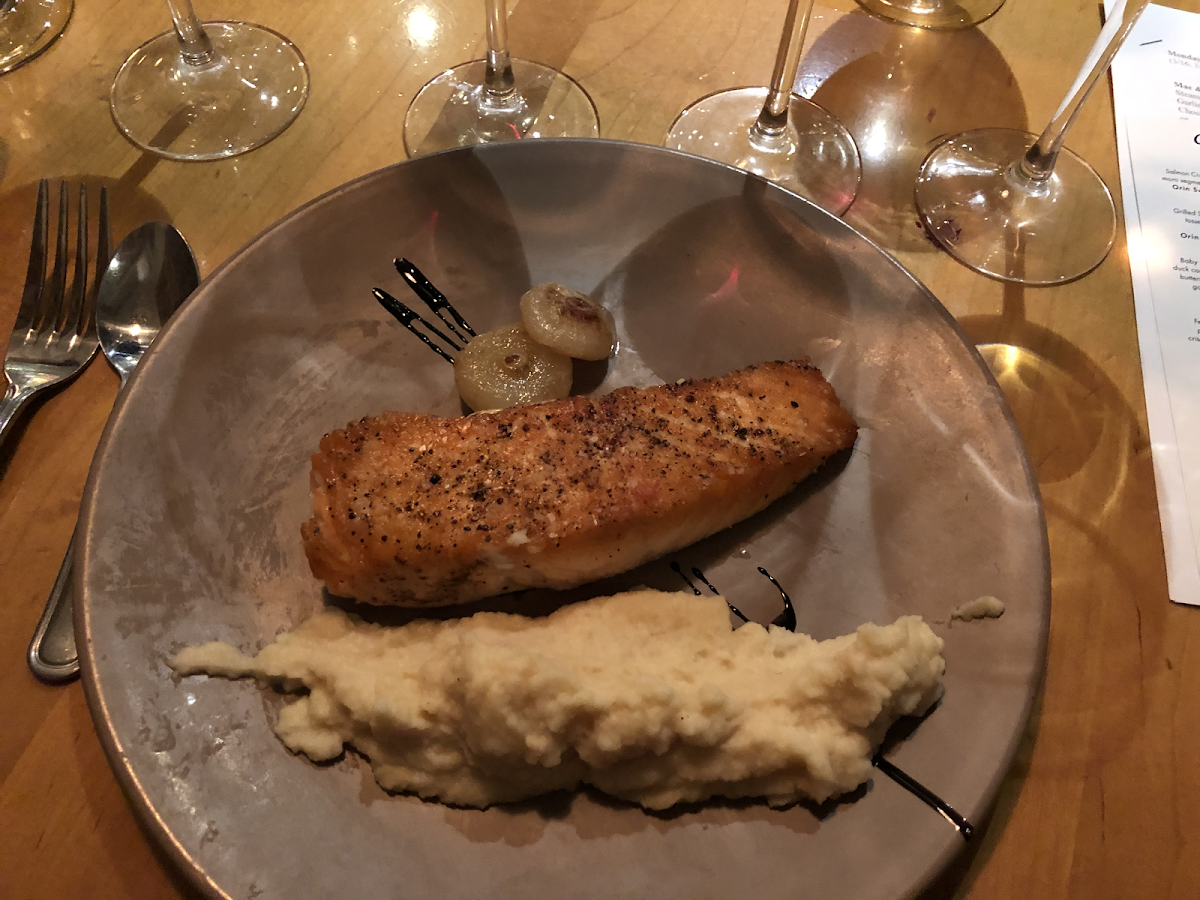 Salmon with celery root purée and cipollini onions.