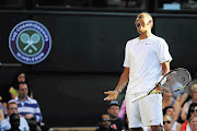 EUREKA! Nick Kyrgios of Australia reacts after his fourth-round win against Rafael Nadal of Spain on day eight of the Wimbledon Lawn Tennis Championships in London