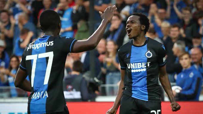 South African star forward Percy Tau (R) celebrate with his Club Brugge teammate during a match.