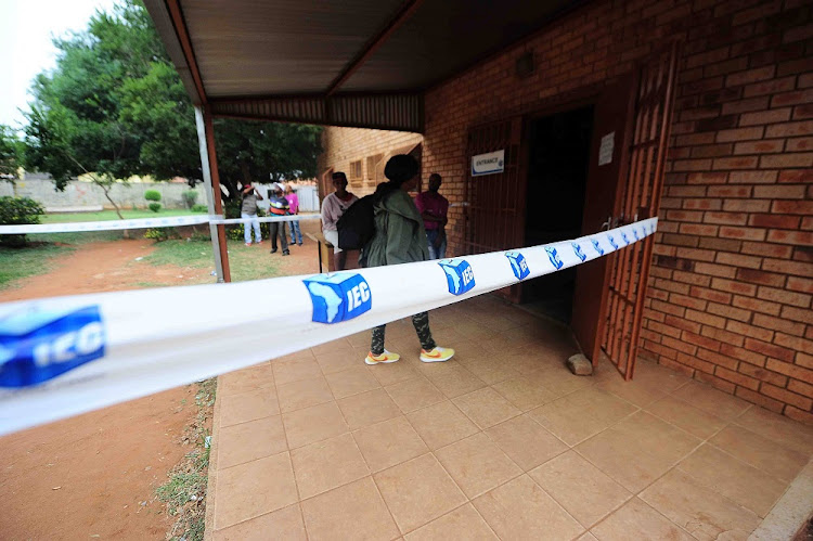 Voters going in to the voting station at Tetelo Secondary School during the by-elections in ward 14, Protea Glen, Soweto.