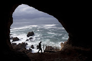 A view of the sea and rocks from inside a cave at Pinnacle Point.