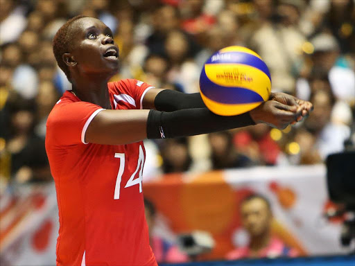 Mercy Moim receives the ball ball during 2015 FIVB Women World Cup in Japan. /COURTESY