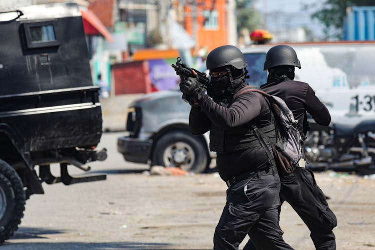 Police take part in an operation on the surroundings of the National Penitentiary following a fire in Port-au-Prince, Haiti, March 14 2024. Picture: REUTERS/Ralph Tedy Erol