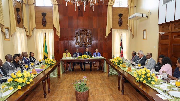 President Uhuru Kenyatta and Jamaican Prime Minister Andrew Holness lead their respective delegations in bilateral talks at the Jamaican Prime Minister's Office in Kingston, Jamaica.