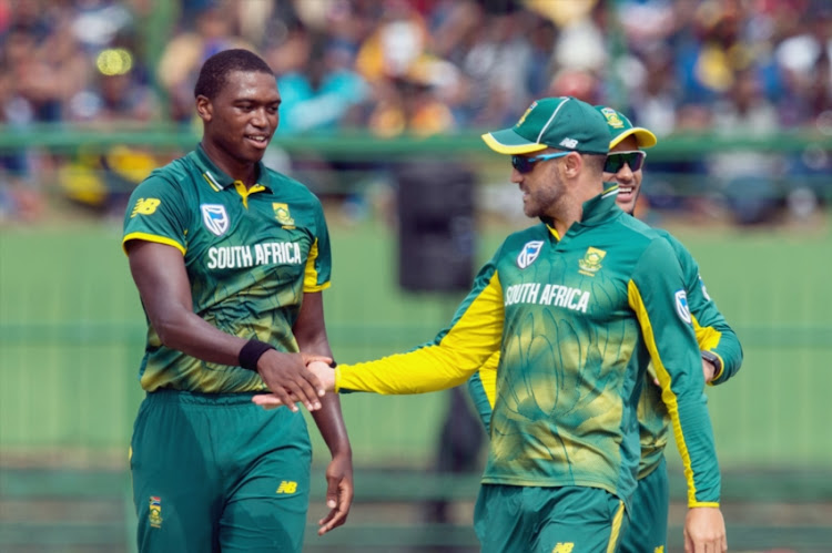 Lungi Ngidi of South Africa celebrates the wicket of Upul Tharanga of Sri Lanka (not in picture) along with Captain Faf du Plessis during the 3rd ODI between Sri Lanka and South Africa at Pallekele International Cricket Stadium on August 05, 2018 in Pallekele, Sri Lanka.