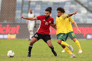 Rabia Ramadan Alsshadi of Libya challenged by Keagan Dolly of South Africa during the 2019 African Cup Of Nations Qualifier match between South Africa and Libya at the Moses Mabhida Stadium, Durban on 08 September 2018.