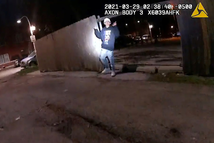 Adam Toledo, 13, holds up his hands a split second before he was shot by police in Little Village, a neighborhood on the West Side of Chicago, Illinois on March 29, 2021 in a still image from police body camera video.