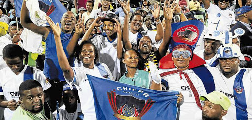 All hyped up Fans enjoy themselves during the socer match between Chippa United and Jomo Cosmos at Buffalo City Stadium in February. Chippa won 2-1.