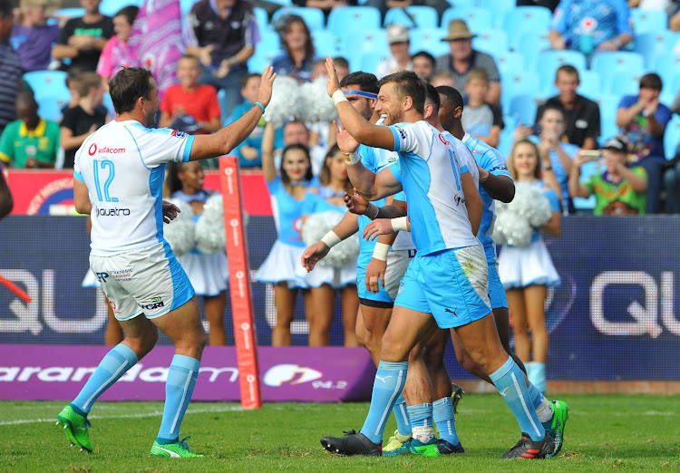 Jesse Kriel of the Vodacom Blue Bulls celebrates a try with teammates during the Super Rugby match against the Rebels 21 April 2018 at Loftus Versfeld Stadium.