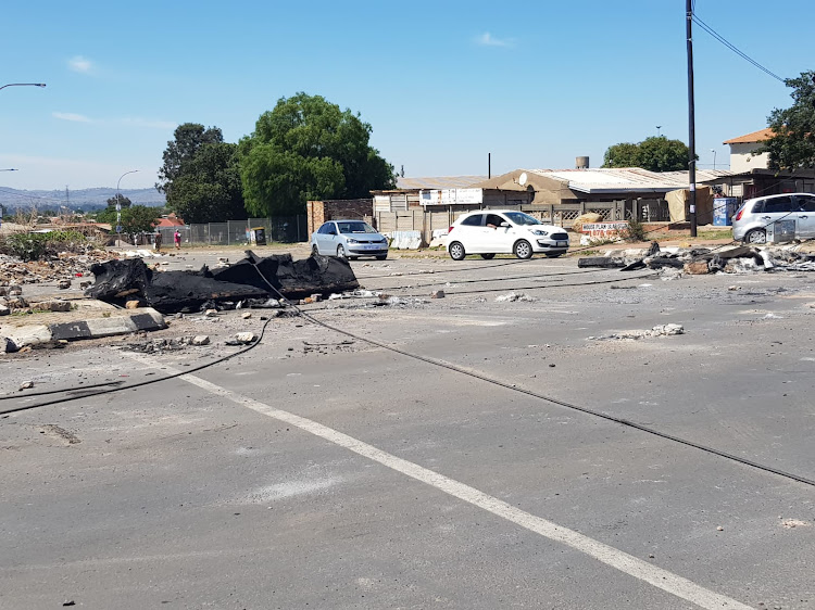 Debris along the Chris Hani Road in Soweto on Monday monring.