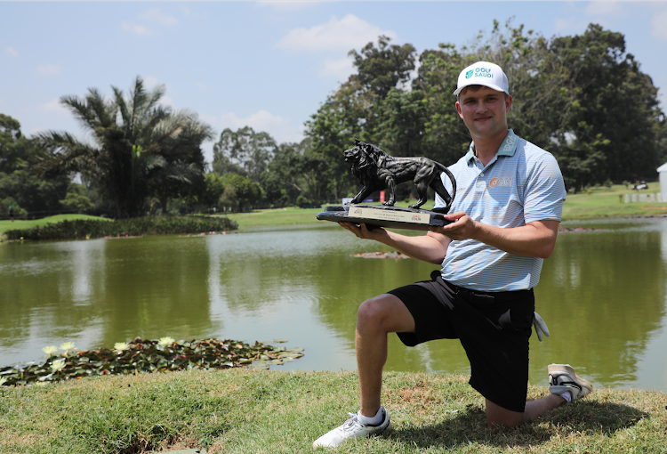 Kipp Popert winner of the G4D Tour poses with the winners trophy at Muthaiga