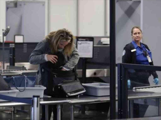 Pre-flight security checks are part of the travelling routine. AGENCIES