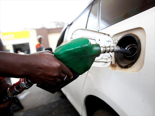 An employee pumps fuel into a car at a Shell petrol station in Nairobi, Kenya, September 20, 2018. /REUTERS