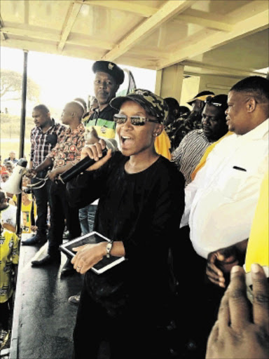 new tune: Former EFF chief whip Ayanda Tshabalala takes a public pledge as she joins the ANC in Mpumalanga on SaturdayPHOTO: Supplied