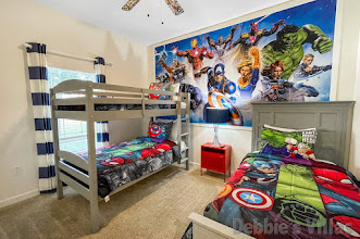 Avengers-themed Bedroom 4 on the ground floor with sleeping for 3 guests