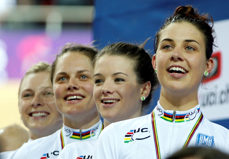 The Australia team of (L-R) Annette Edmondson, Ashlee Ankudinoff, Amy Cure and Melissa Hoskins during a podium ceremony at the Women's Team pursuit Final at the UCI Track Cycling World Cup near Paris on February 19, 2015.