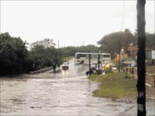 DISASTROUS: Heavy rain and floods wreaked havoc in several parts of KwaZulu-Natal, disrupting traffic, uprooting trees and killing four children. 18/06/08. © Unknown.