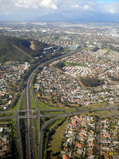 N1 in the Cape Town northern suburbs with Bellville's CBD in background.